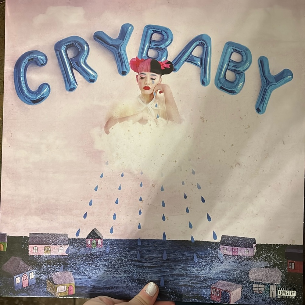Melanie Martinez record on vinyl crybaby like New comes with book.